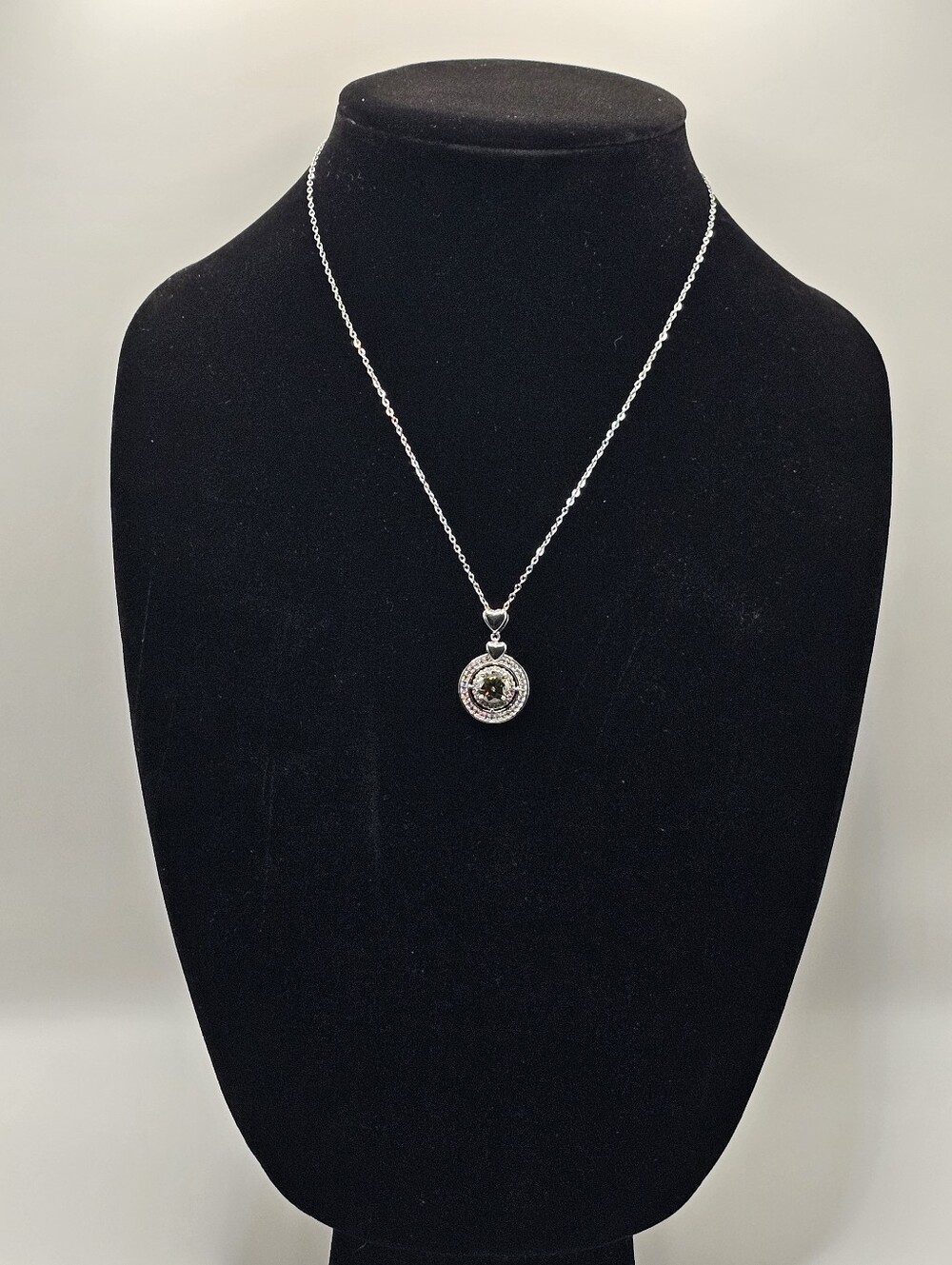 Sterling Silver Heart Halo Pendant Necklace with a Green Moissanite